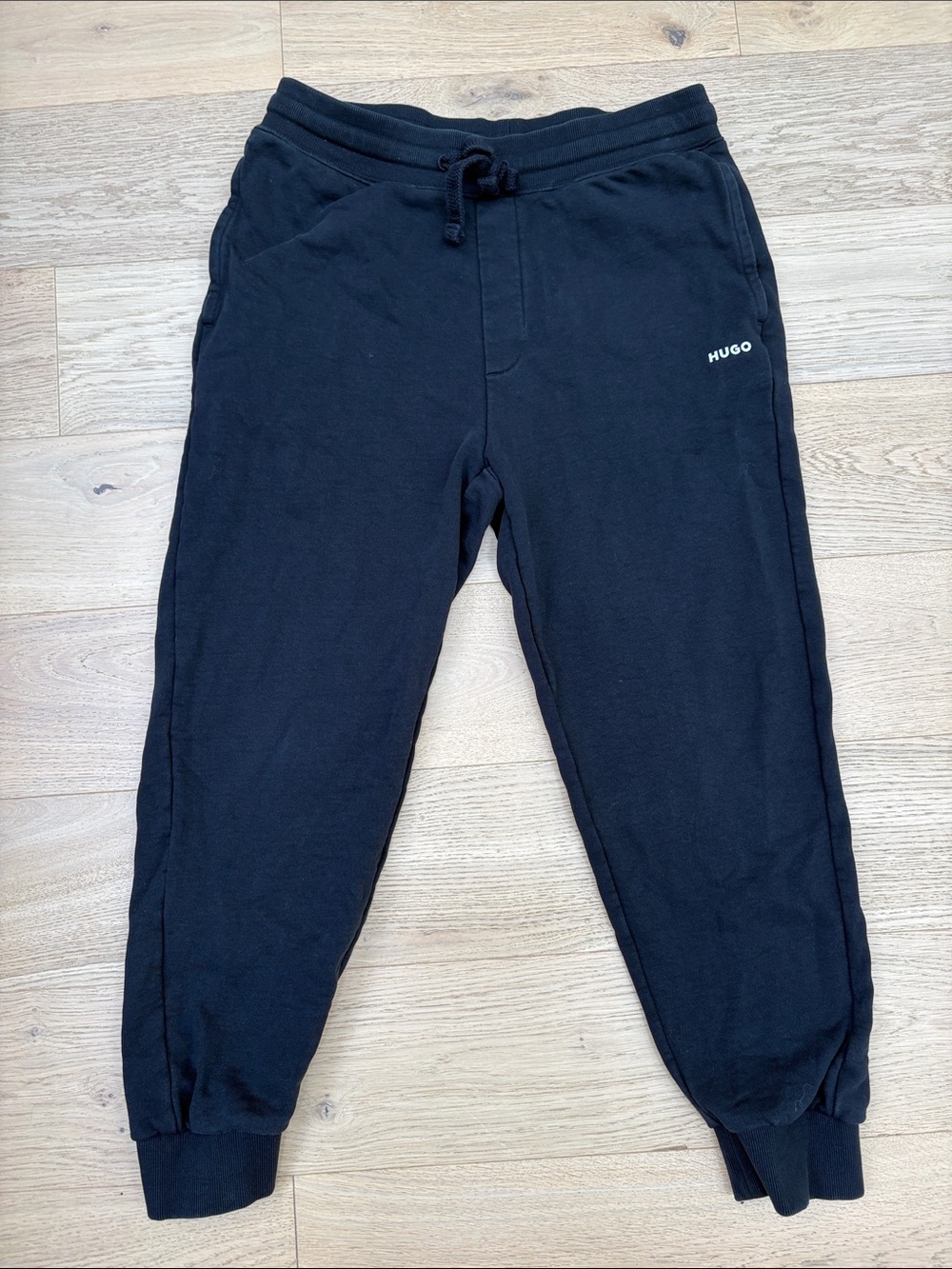 Hugo Boss Black Sweatpants with White HUGO Logo fits small even though is a med